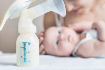 Baby staring at breast pump