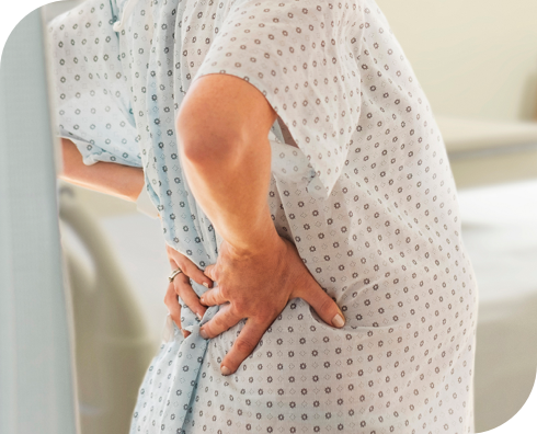 Pregnant woman in hospital gown