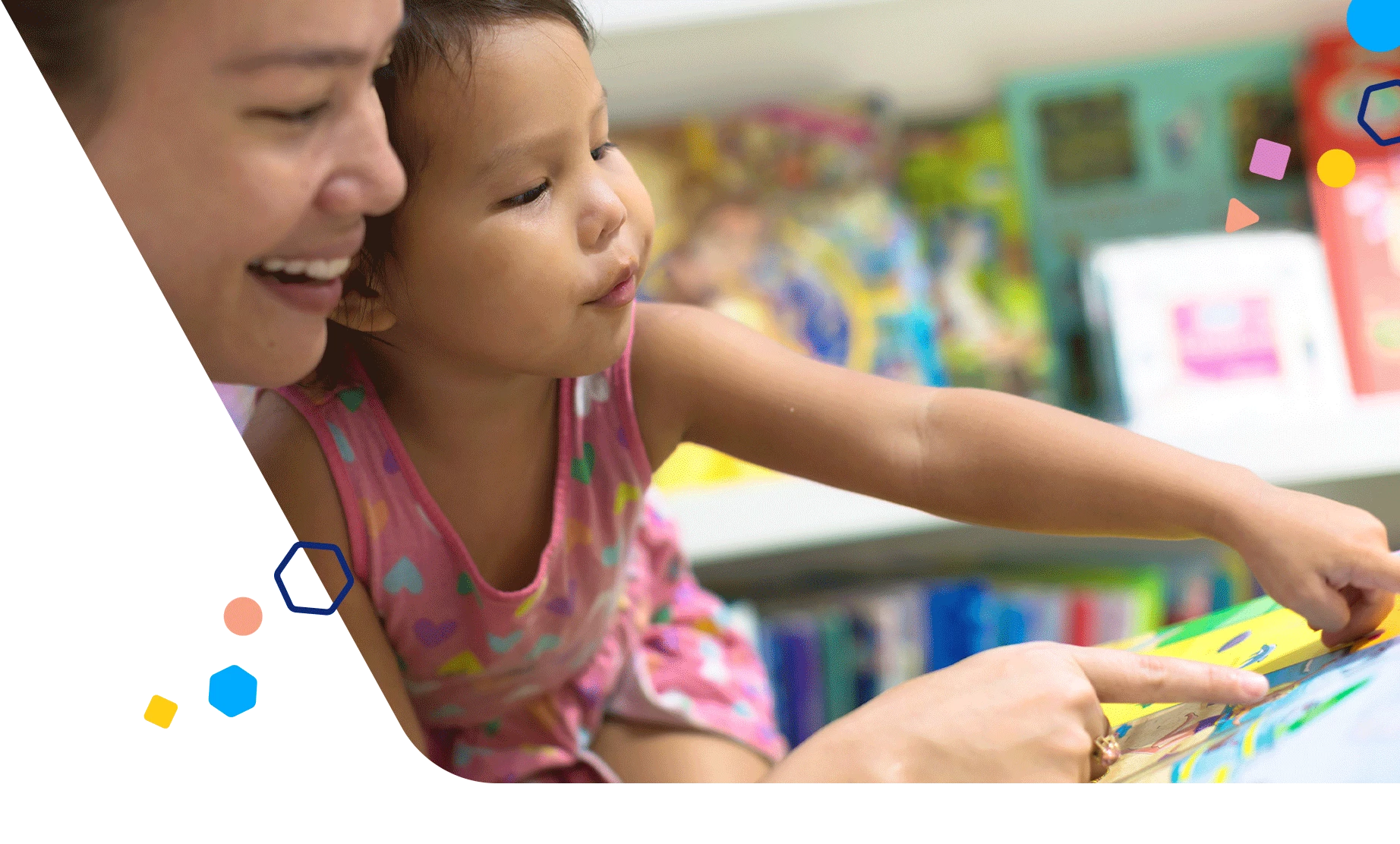 Mom and daughter reading a book