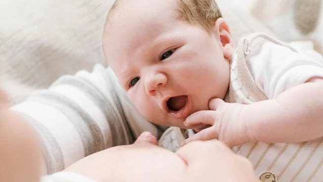 Mom breastfeeding infant