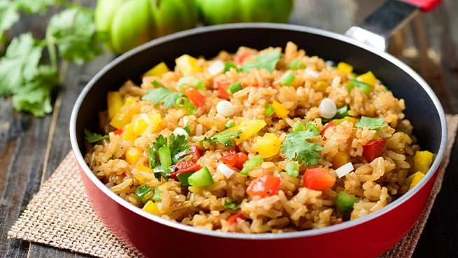 Close up of a pot of vegetable paella