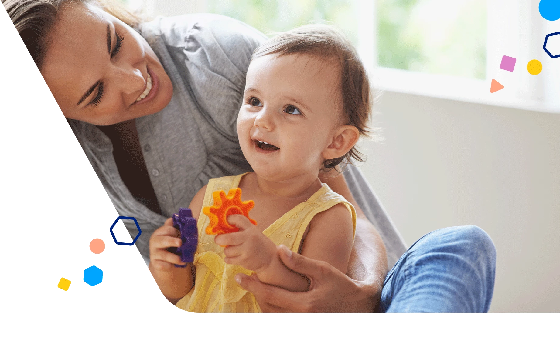 Little girl and mom playing with colorful toys