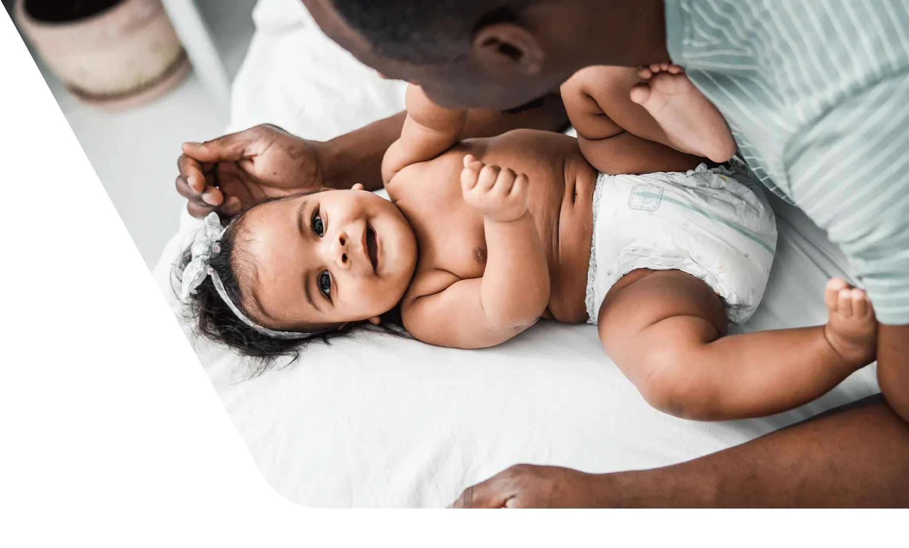 Dad playing with baby