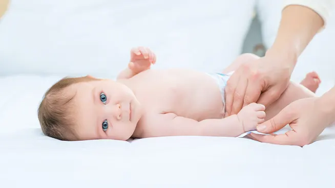 Closeup of baby getting a diaper change