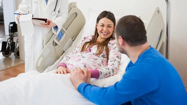 Expecting couple in the delivery room