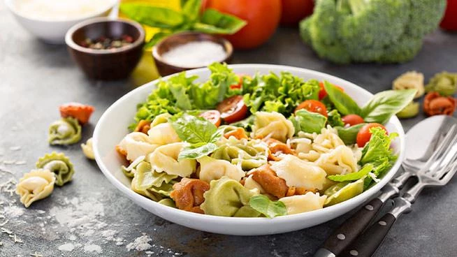 Bowl of tortellini and broccoli salad