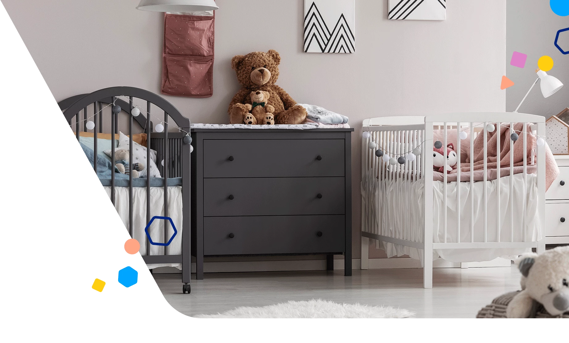 Two cribs in a nursery