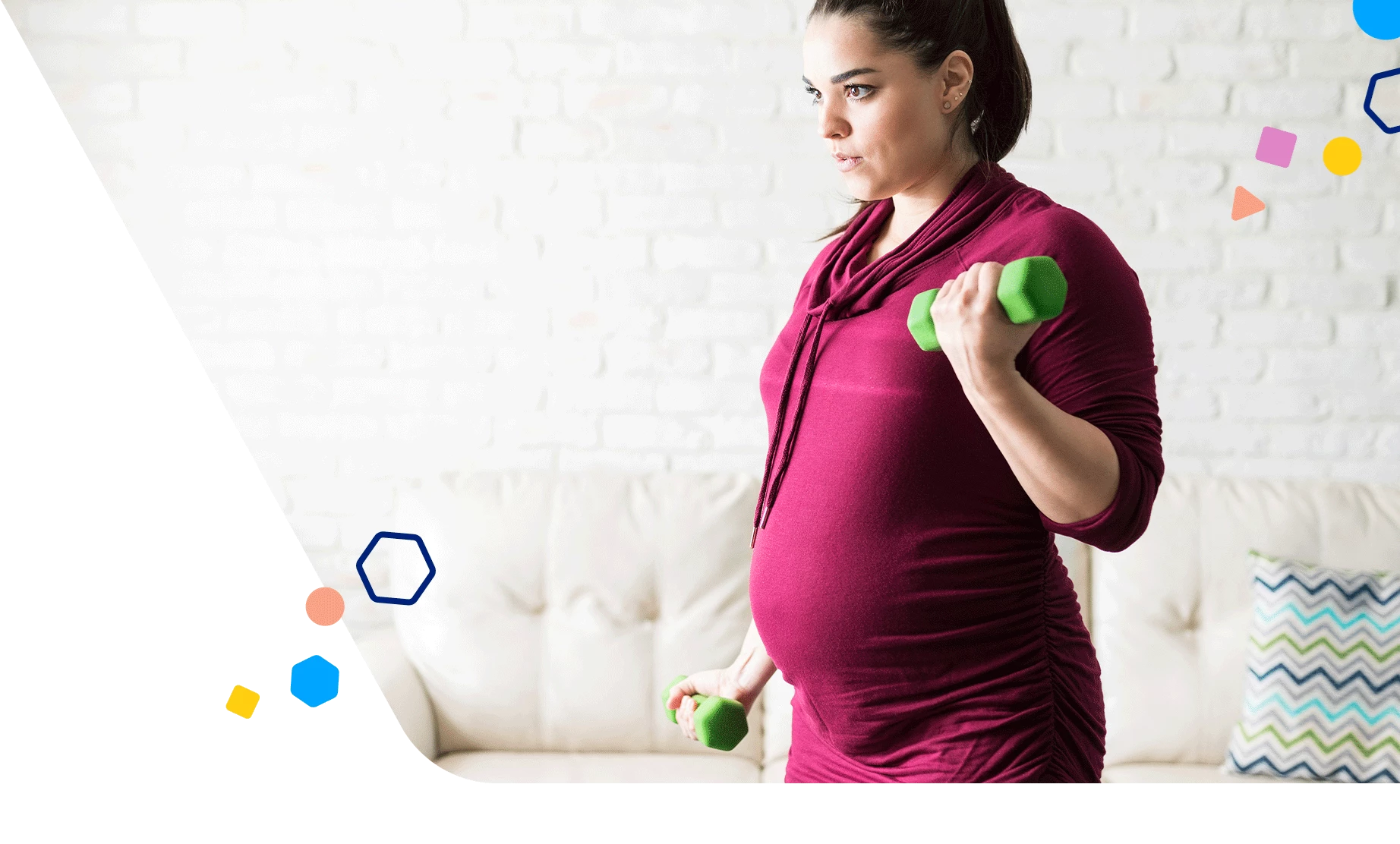 Pregnant woman lifting light weights