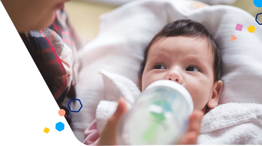 Mom Bottle Feeding Baby