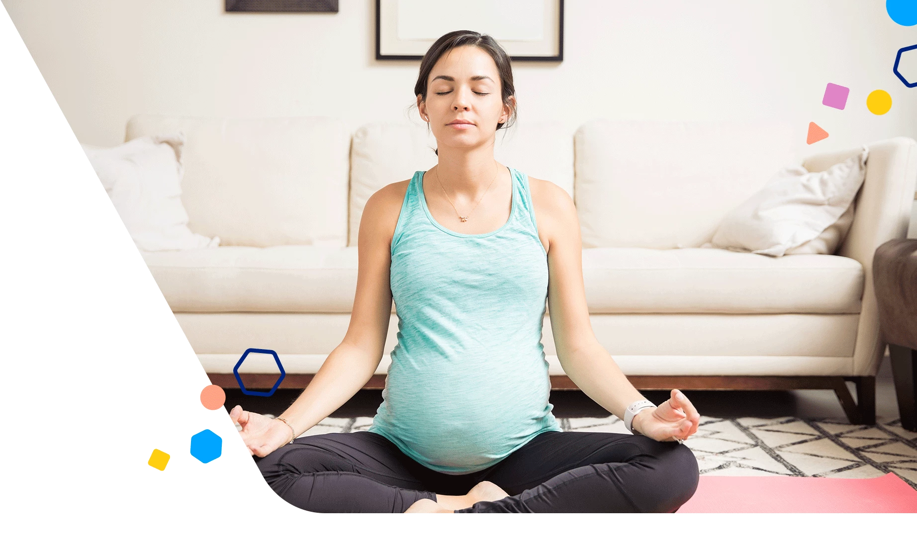 Pregnant mom doing yoga in her living room