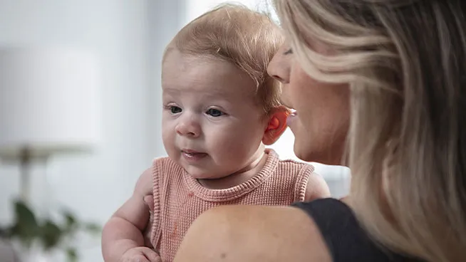 Mom comforting upset baby